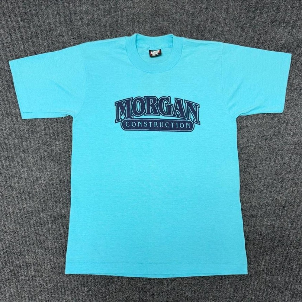 Vintage 90s Morgan Construction T Shirt Mens Small Cyan Blue Screen Stars USA